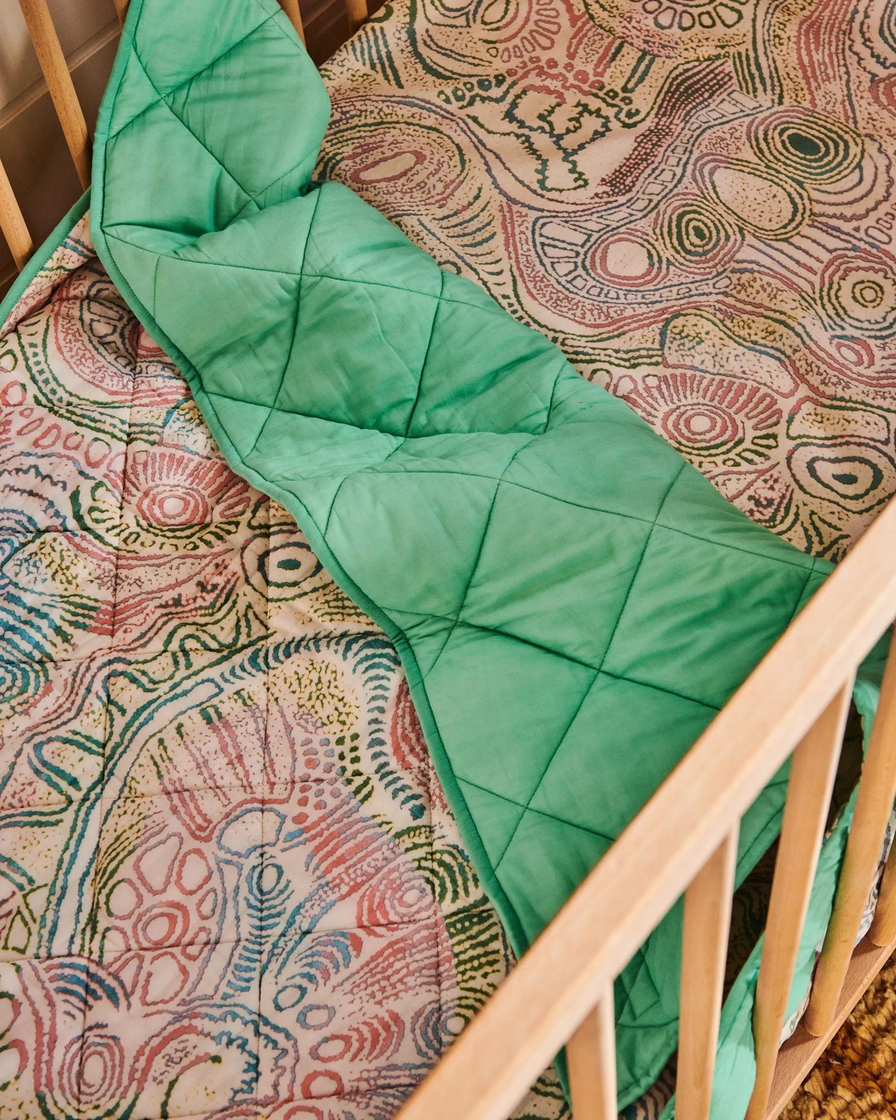 Tjala Tjukurpa Pastel Organic Cotton Quilted Cot Bedspread