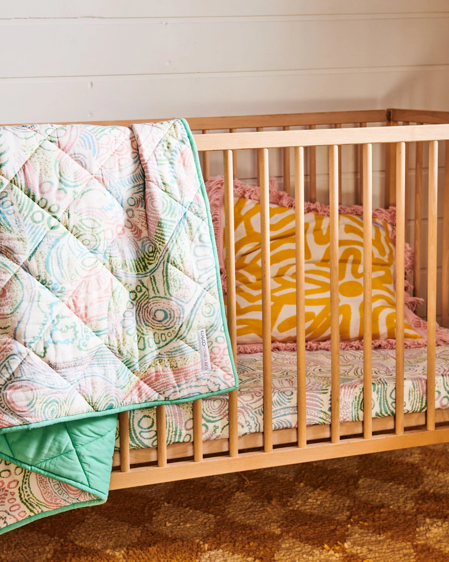 Tjala Tjukurpa Pastel Organic Cotton Quilted Cot Bedspread